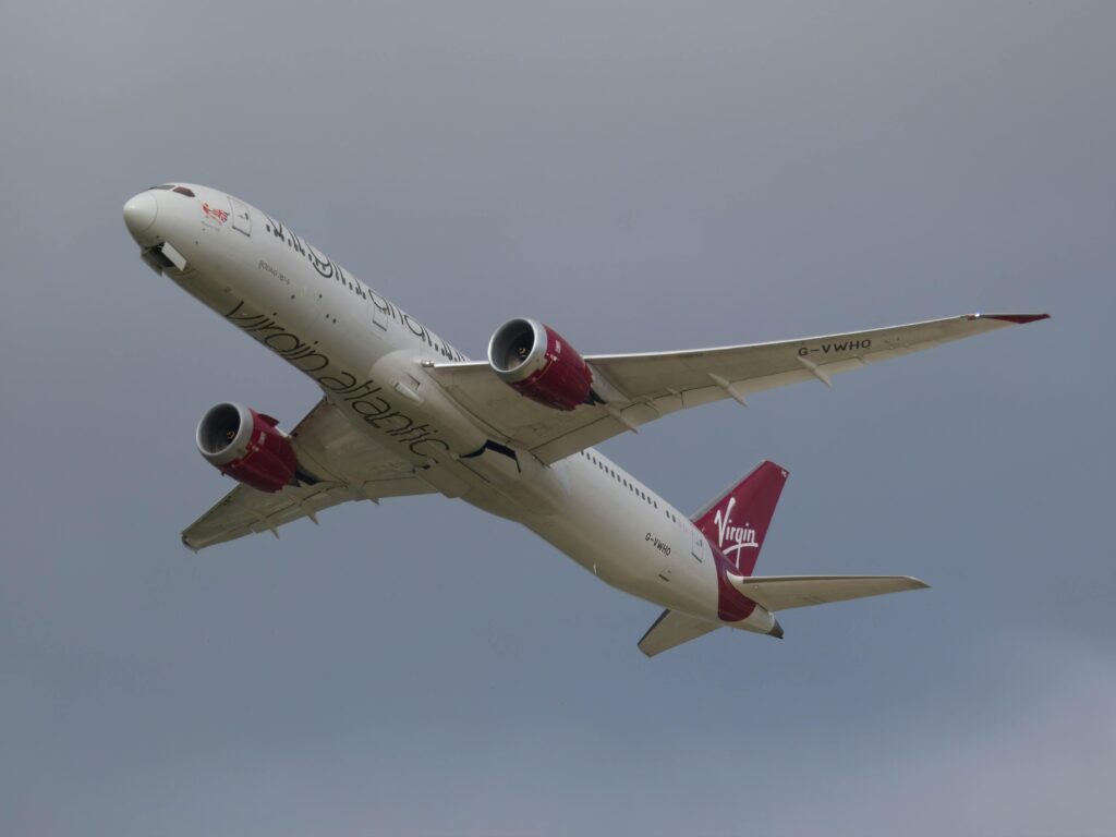 a plane flying in the sky Corneel Koster Virgin Atlantic